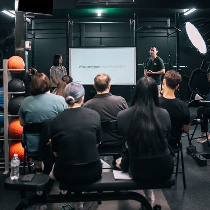 Members participating in a workshop focused on mindset and yearly fitness goals